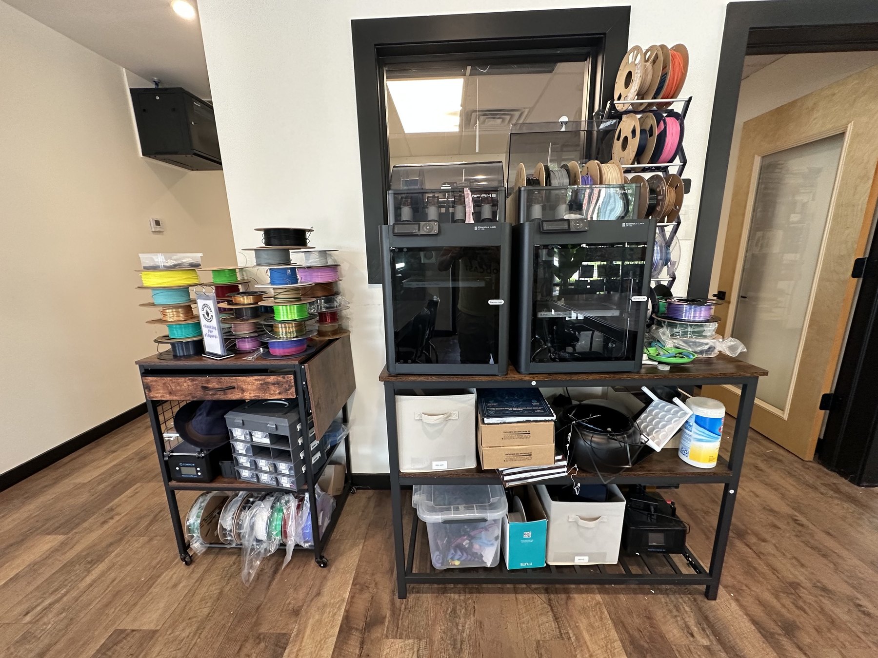 3D printers and colorful filament spools at Side Quest Game Lounge in Oklahoma City