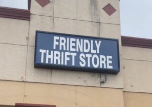 Exterior sign for Friendly Thrift Store in Oklahoma City.