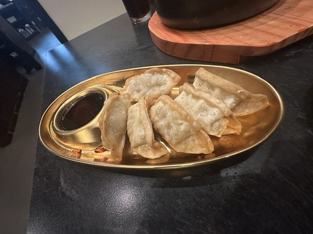 Fried Korean dumplings with dipping sauce at Mr. Kimchi Korean Bistro in Oklahoma City.