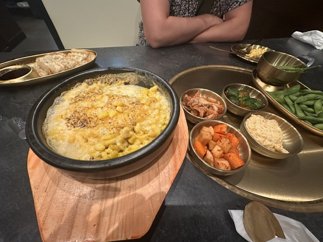 Corn cheese and Korean side dishes at Mr. Kimchi Korean Bistro in Oklahoma City.
