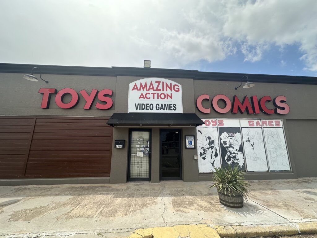 Exterior of Amazing Action in Oklahoma City with large Toys and Comics signs above the entrance