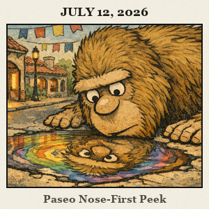 Bigfoot, bare and furry, leans nose-first toward a rainbow puddle on the Paseo Arts District sidewalk, with colorful stucco buildings and banners in the background.