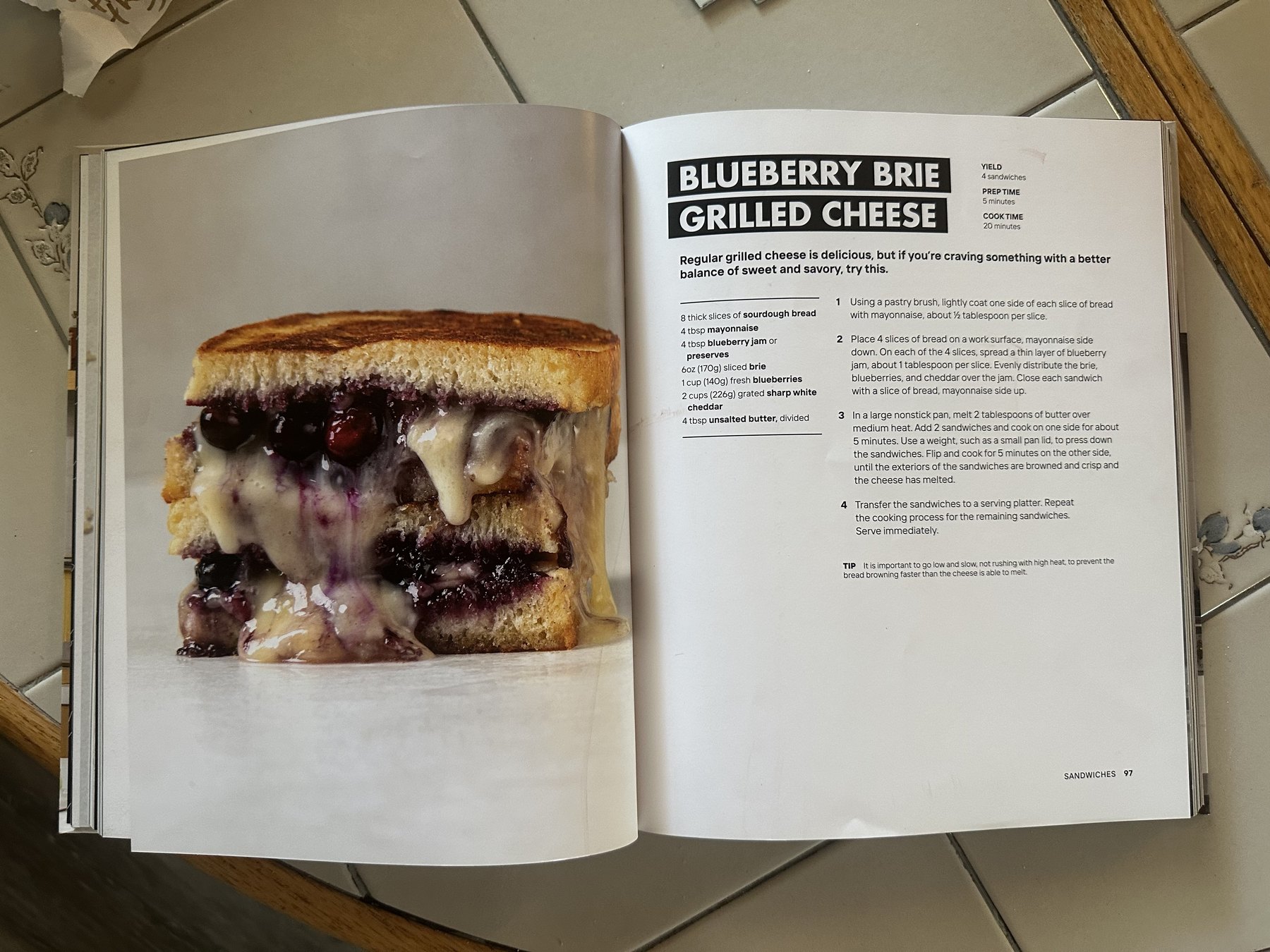 Open Knife Drop cookbook showing the Blueberry Brie Grilled Cheese recipe page.