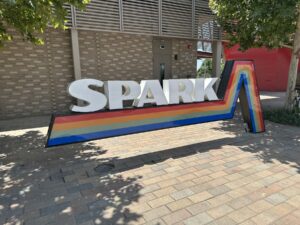 SPARK sign with rainbow trim near Scissortail Park in Oklahoma City