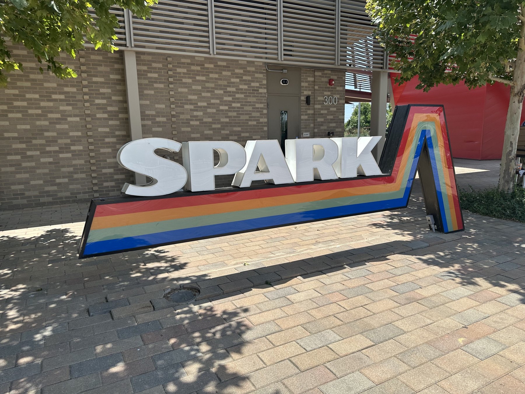 SPARK sign with rainbow trim near Scissortail Park in Oklahoma City