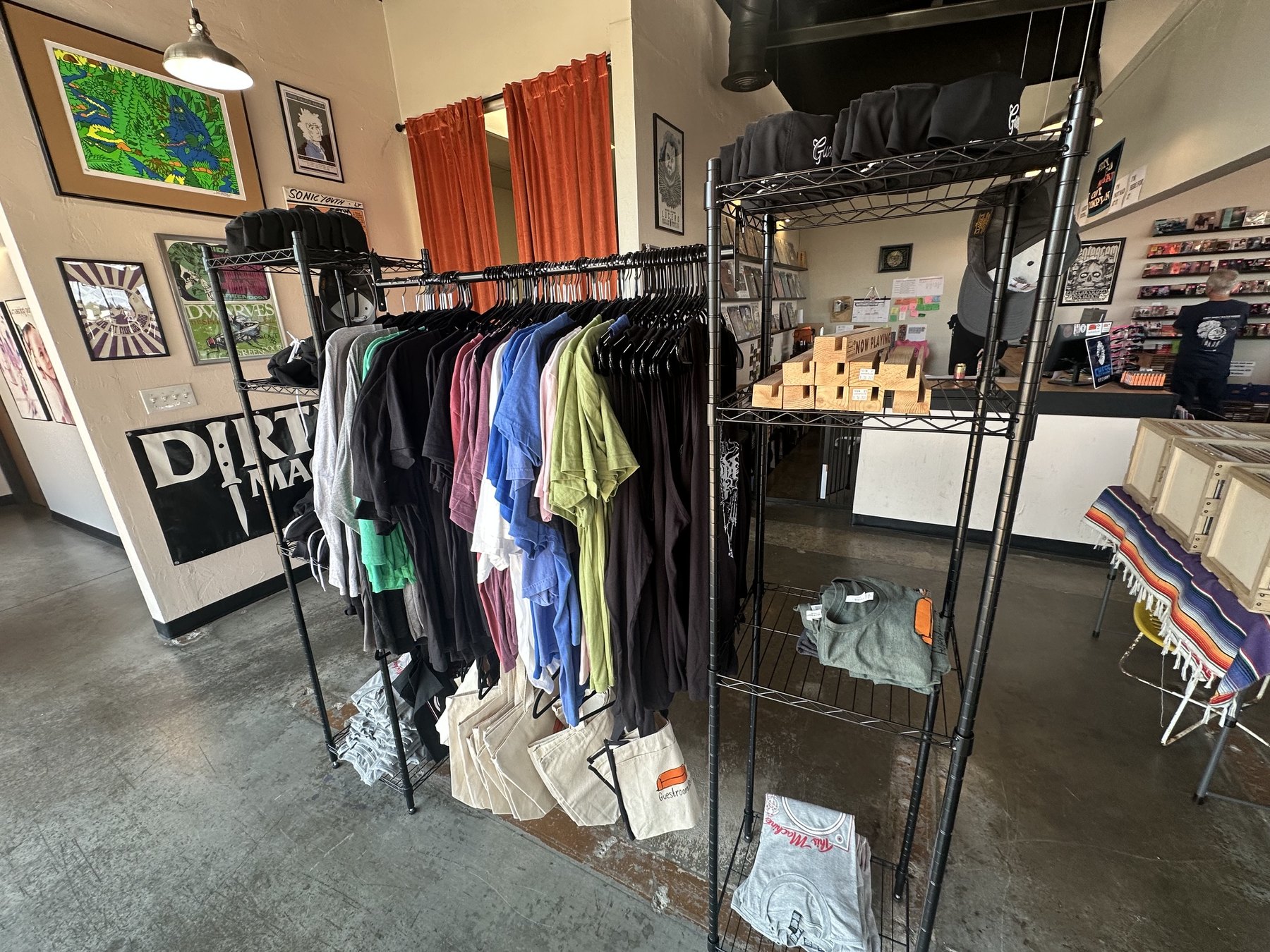 Merchandise racks and front counter inside Guestroom Records in Edmond, Oklahoma.