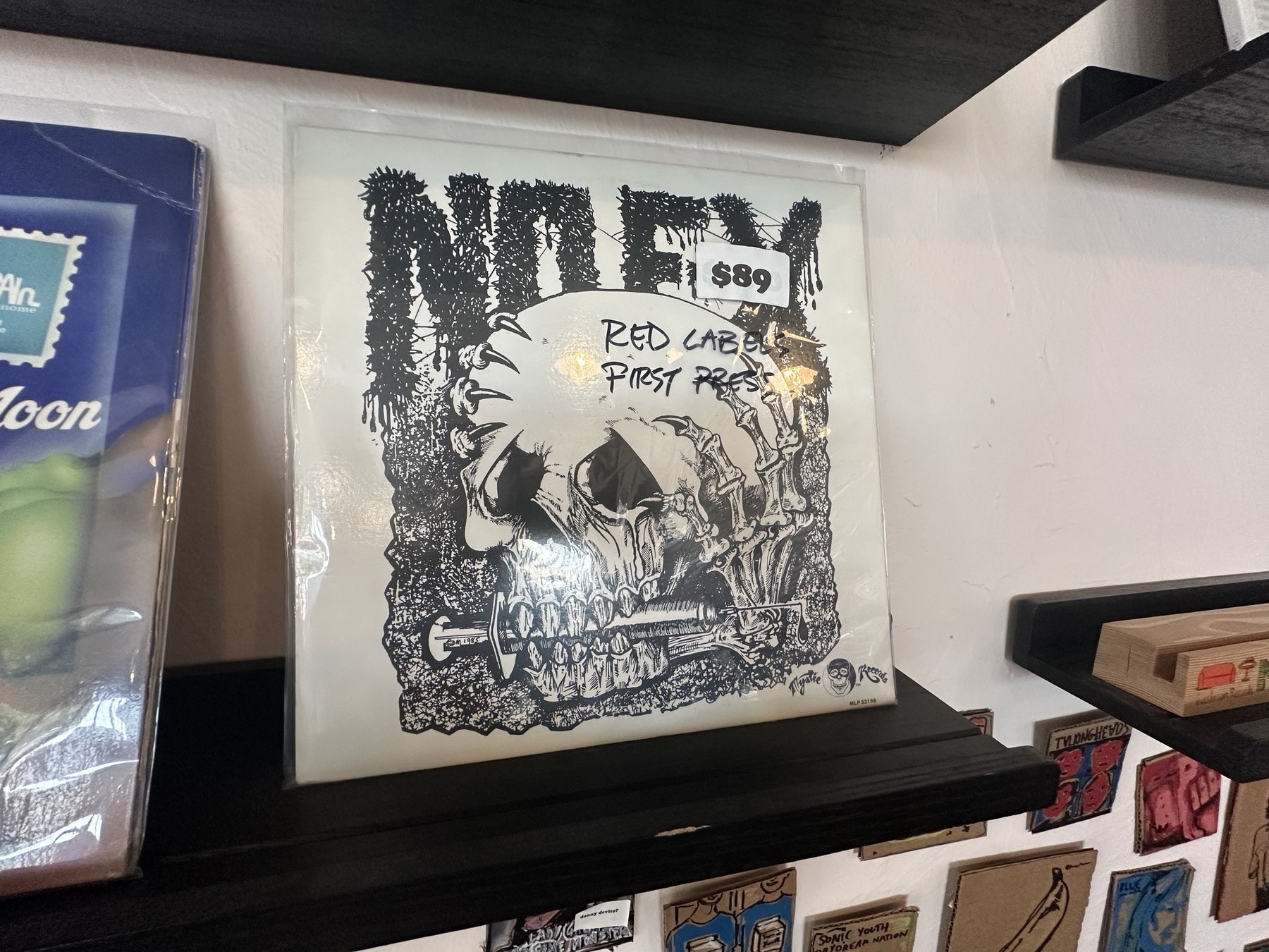 NOFX Red Label first press record on display at Guestroom Records Edmond.