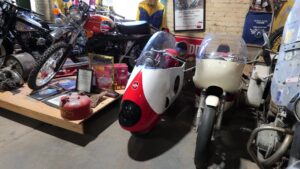 Vintage motorcycles and racing bikes on display inside Seaba Station Motorcycle Museum in Warwick, Oklahoma.