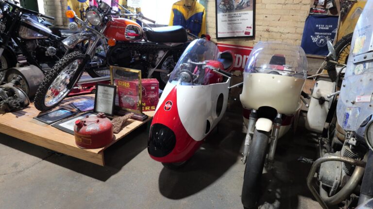 Vintage motorcycles and racing bikes on display inside Seaba Station Motorcycle Museum in Warwick, Oklahoma.