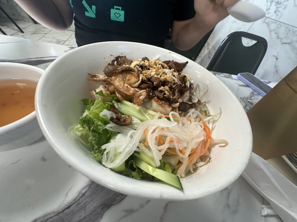 Vietnamese noodle bowl with shrimp, grilled meat, vegetables, and dipping sauce at Pho Cuong in Oklahoma City.