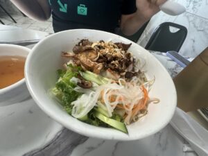 Vietnamese noodle bowl with shrimp, grilled meat, vegetables, and dipping sauce at Pho Cuong in Oklahoma City.