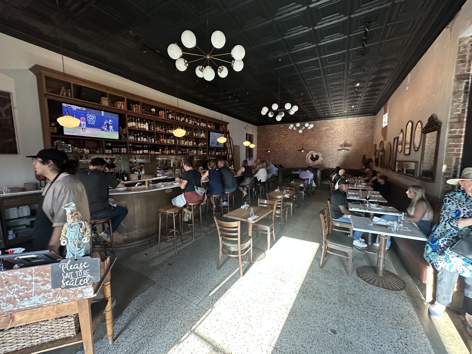 Dining room and bar inside Red Rooster in Oklahoma City's Paseo District