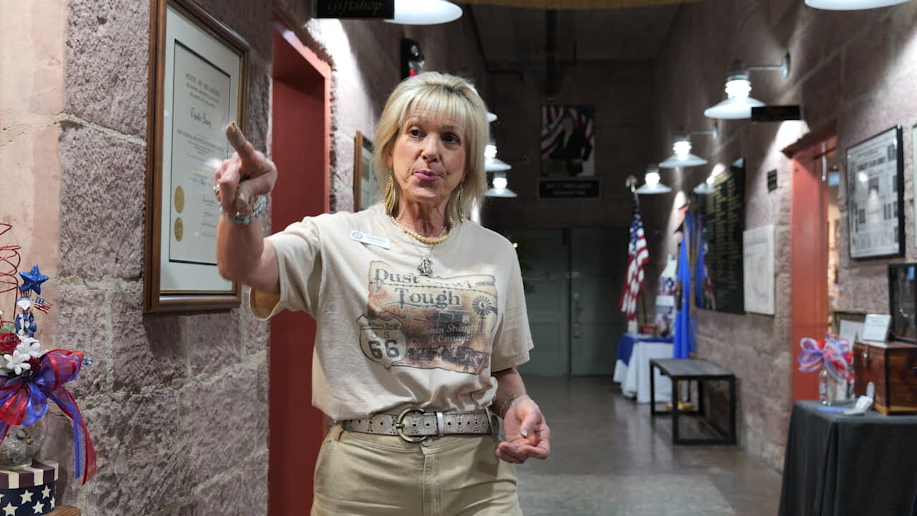Guide Susan Pordos leading a tour inside the Route 66 Interpretive Center in Chandler