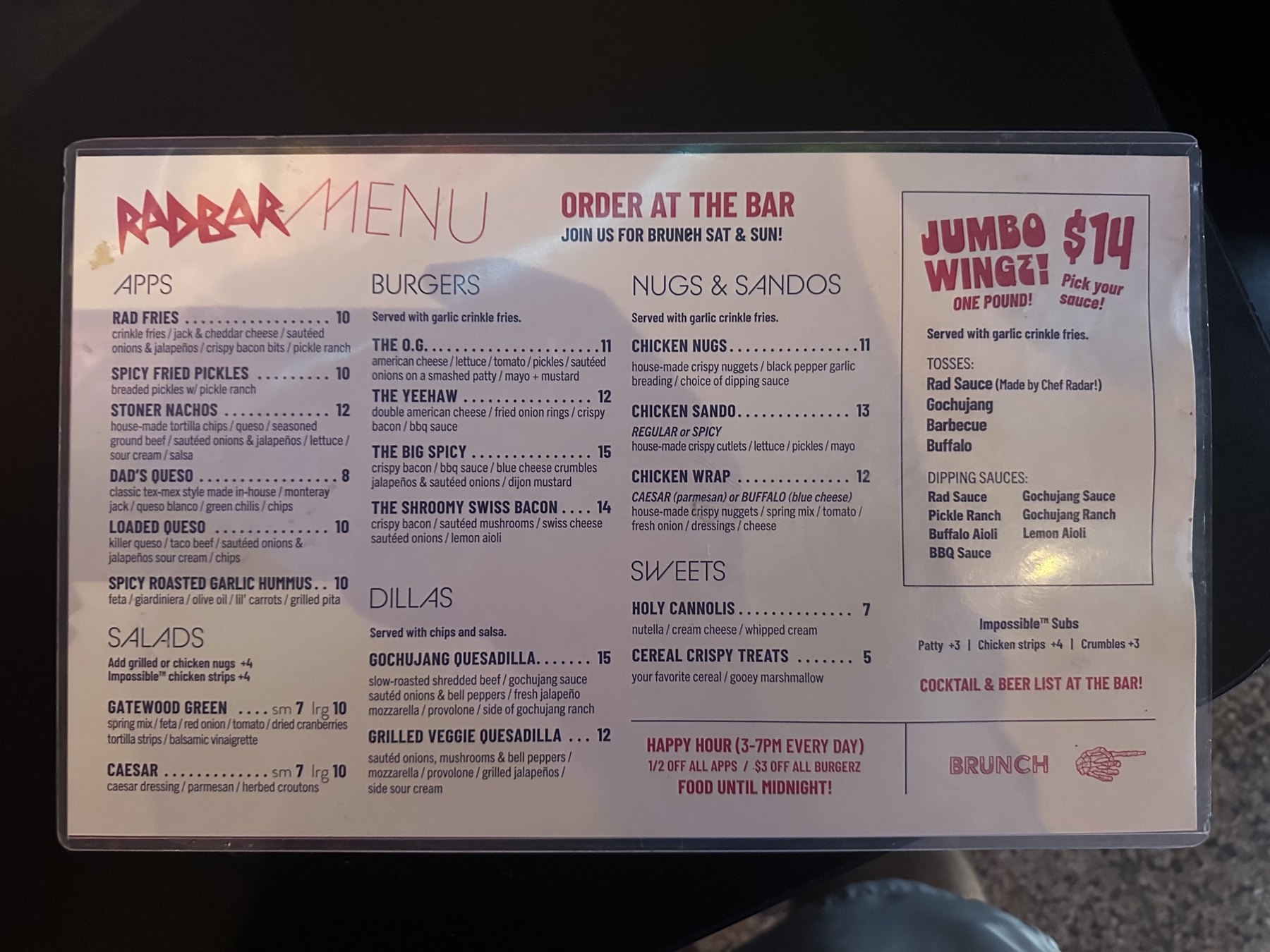 Rad Bar main menu showing appetizers, burgers, nuggets, sandwiches, quesadillas, sweets, jumbo wings, and happy hour specials.