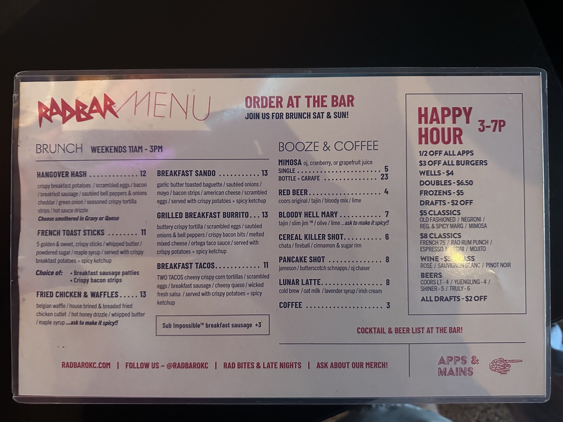 Rad Bar brunch menu showing weekend brunch items, booze and coffee options, and happy hour specials.
