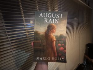 Front cover of August Rain by Oklahoma author Marlo Holly.