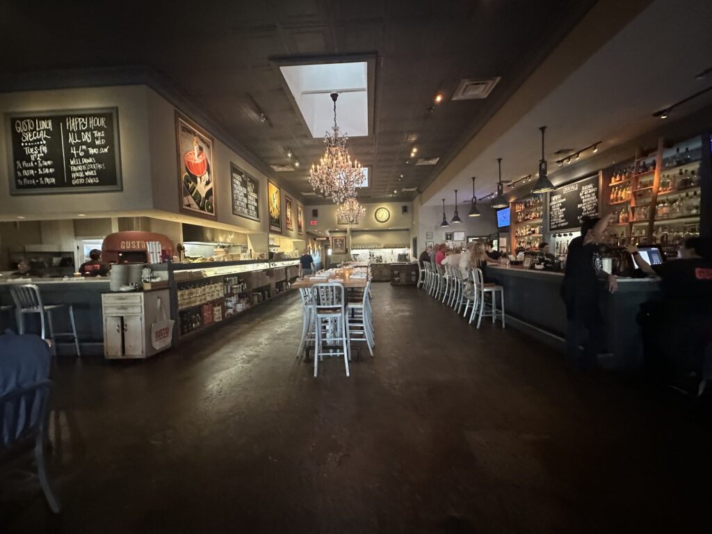 Wide view of the Pizzeria Gusto dining room and bar in Oklahoma City.