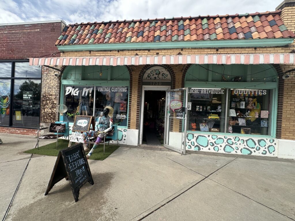 Dig It storefront in Oklahoma City with turquoise trim, window displays, and a sidewalk sign outside.