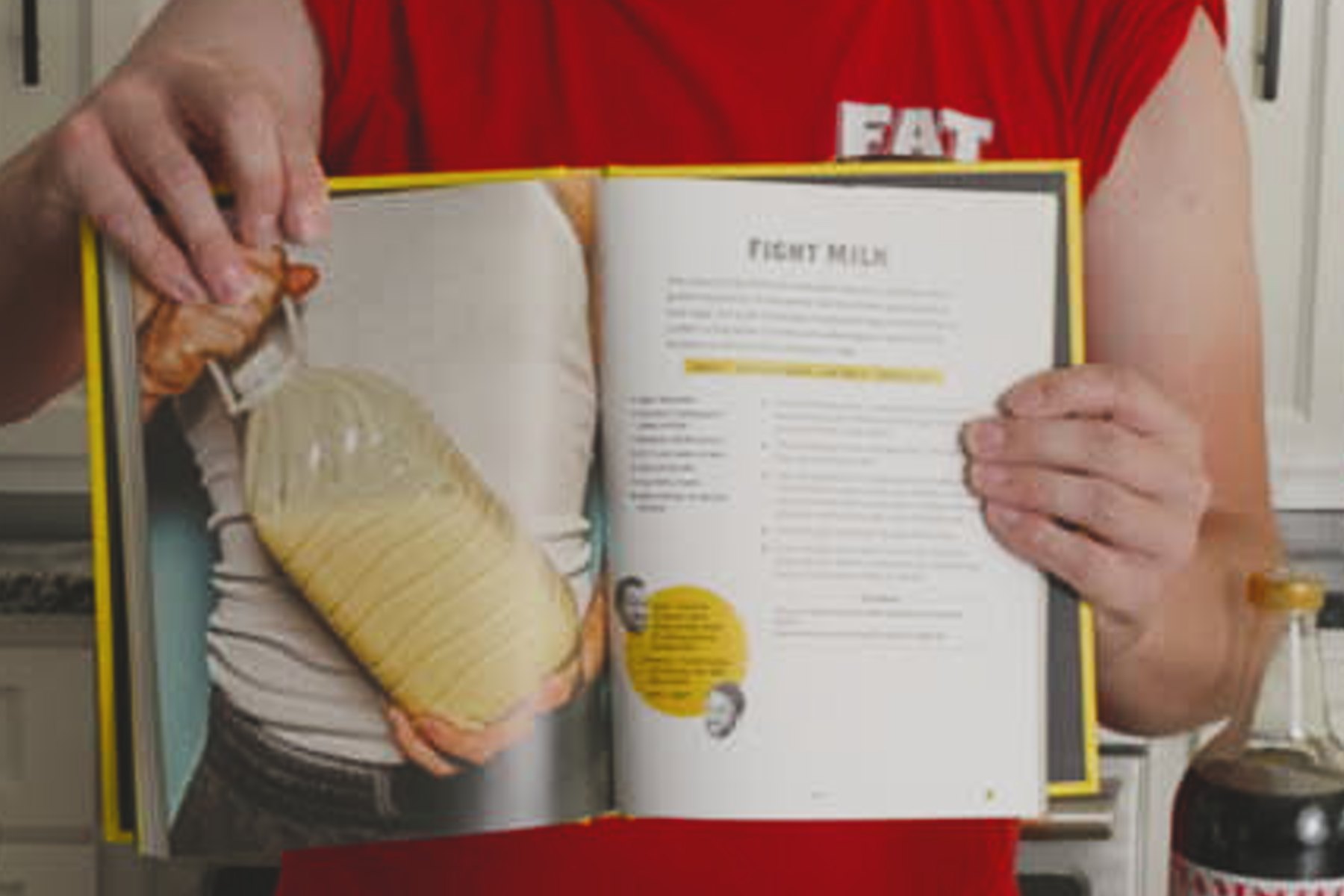 Open cookbook showing the Fight Milk recipe page with a photo of the drink.