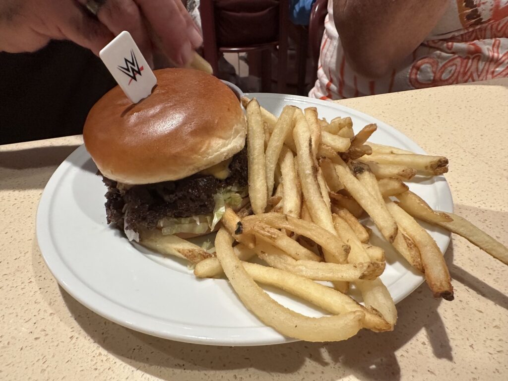 WWE-themed smashburger with fries at Netflix Bites Dallas