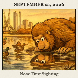 Bigfoot at Scissortail Park in Oklahoma City leans toward the lake edge with the city skyline, broad lawns, walking paths, and downtown in view.