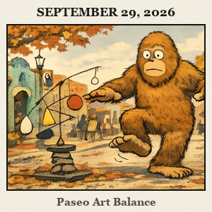 Bigfoot balances on one foot while tiptoeing around a delicate sculpture along a colorful Paseo Arts District street with banners and galleries nearby.