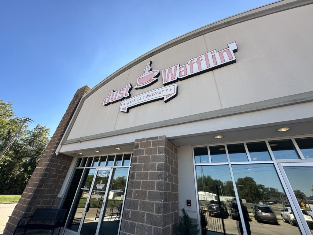 Exterior sign for Just Wafflin’ in Stillwater, Oklahoma